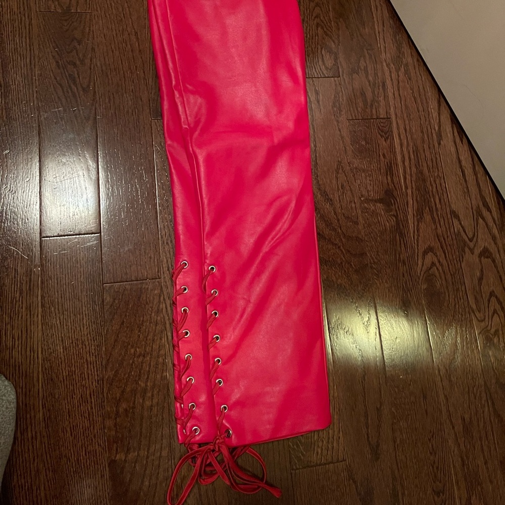 Hot red lace up leather pants. Lovers and Friends in cherry red